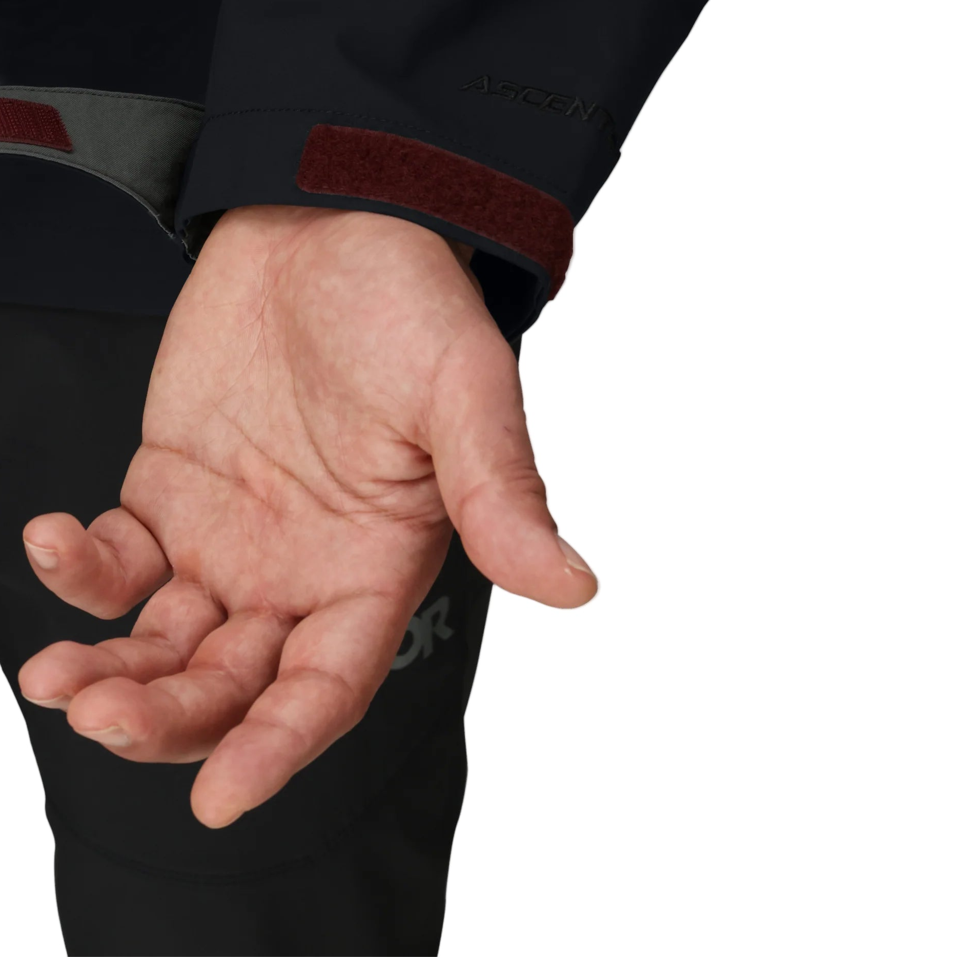 Outdoor Research Foray 3L Rain Jacket sleeve detail showing adjustable hook and loop cuffs that can be tightened to seal out rain and wind or loosened to fit over large gloves | Lightweight breathable 3 layer waterproof hiking shell with AscentShell Dry membrane and recycled nylon — best rain jacket with glove compatible cuffs for trekking climbing and wet weather