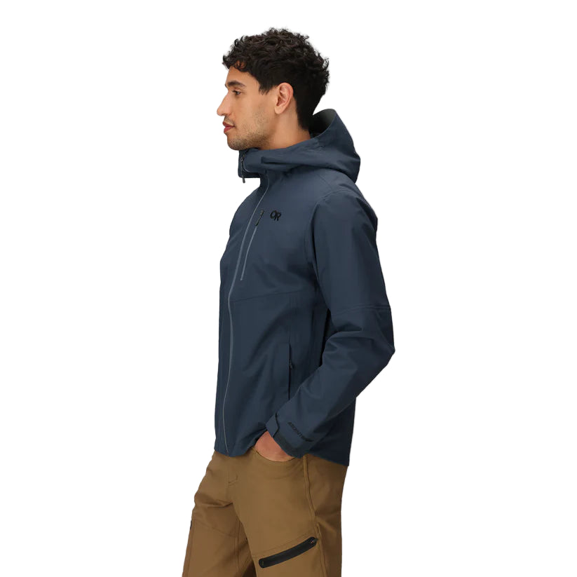 Outdoor Research Foray 3L Rain Jacket in Atlantic deep blue 3/4 side view on model | Lightweight 3 layer waterproof breathable hiking shell with AscentShell Dry membrane TorsoFlo side vents and recycled nylon - the best sustainable rain jacket for backpacking trekking and everyday wet weather protection