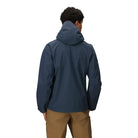 Outdoor Research Foray 3L Rain Jacket in Atlantic blue back view on model | Sustainable 3 layer waterproof breathable shell with recycled nylon and Nikwax Direct Dry finish - best lightweight rain jacket for hiking camping climbing and everyday wet weather use