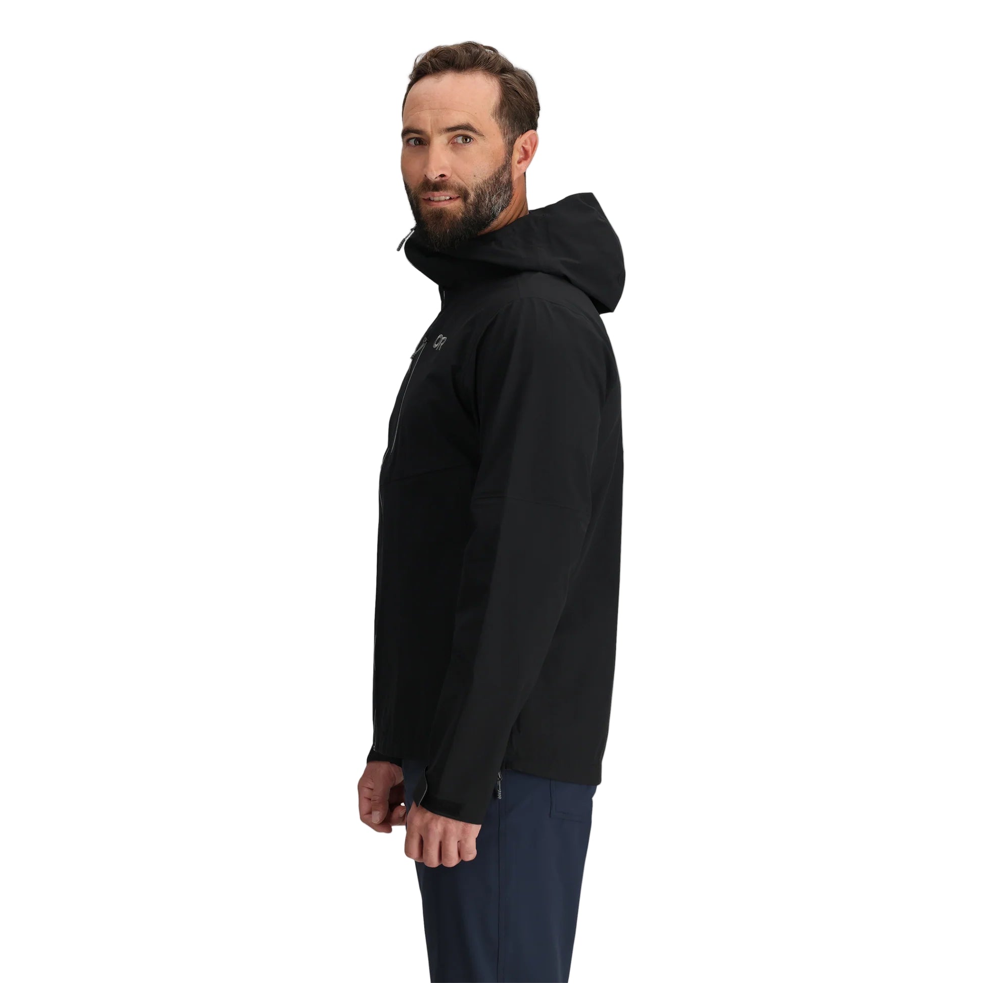 Outdoor Research Foray 3L Rain Jacket in Black 3/4 side view on model | Breathable 3 layer waterproof hiking shell with AscentShell Dry membrane TorsoFlo ventilation and recycled nylon — best rain jacket for backpacking mountaineering and all weather outdoor use