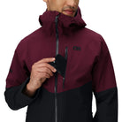 Outdoor Research Foray 3L Rain Jacket exterior chest pocket close up showing quick zip storage for phone snacks or valuables | Lightweight waterproof breathable 3 layer hiking shell with TorsoFlo side vents and AscentShell Dry technology — best rain jacket with chest pocket for trekking and outdoor use