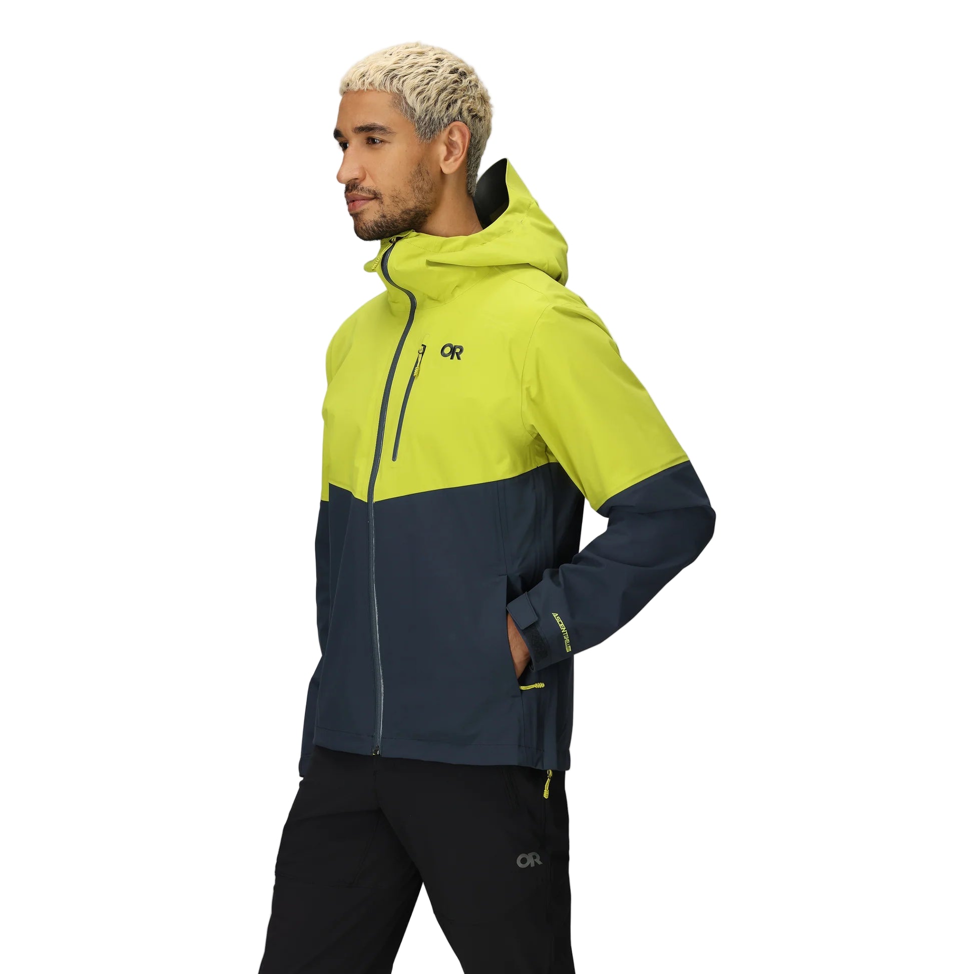 Outdoor Research Foray 3L Rain Jacket in Viper Atlantic navy and highlighter yellow 3/4 side view on model | 3 layer waterproof breathable hiking shell with AscentShell Dry technology and TorsoFlo venting — best rain jacket for outdoor performance tactical missions and travel