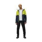 Outdoor Research Foray 3L Rain Jacket in Viper Atlantic navy and bright yellow full body shot on model | 3 layer waterproof breathable rain shell with recycled nylon AscentShell Dry membrane and TorsoFlo side vents — best lightweight hiking rain jacket for outdoor use wet weather and travel