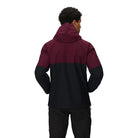 Outdoor Research Foray 3L Rain Jacket in Winterberry maroon and Black colorblock back view on model | 3 layer waterproof breathable outdoor shell with sustainable recycled nylon and Nikwax Direct Dry finish — best rain jacket for hiking tactical operators and everyday wet weather wear