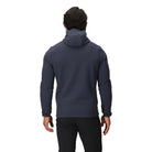 Back view of the Outdoor Research Vigor Plus Fleece Hoodie in Atlantic deep blue, shown on a model with streamlined fit, stretch construction, and hood coverage designed for mobility and cold-weather performance.