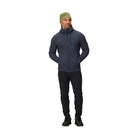 Full body view of the Outdoor Research Vigor Plus Fleece Hoodie in Atlantic deep blue, shown on a model with athletic fit, grid fleece warmth, and streamlined technical design for cold-weather layering, hiking, and alpine pursuits.