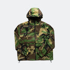 M81 Woodland Camouflage jacket on a light gray background