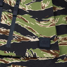 QILO Nordwind WR Browning Jacket in OV Tiger Stripe close-up of QILO branding | QILO NYC streetwear camo jacket with waterproof DWR finish, 4-way stretch, and AquaGuard zippers - one of the best camo jackets with branding detail for tactical and urban wear.