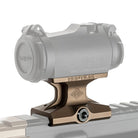 Product shot of the Reptilia DOT Mount in Flat Dark Earth shown mounted on a Picatinny rail highlighting the 7075 T6 aluminum lower one third co witness design compatible with Aimpoint T1 and T2 style optics.