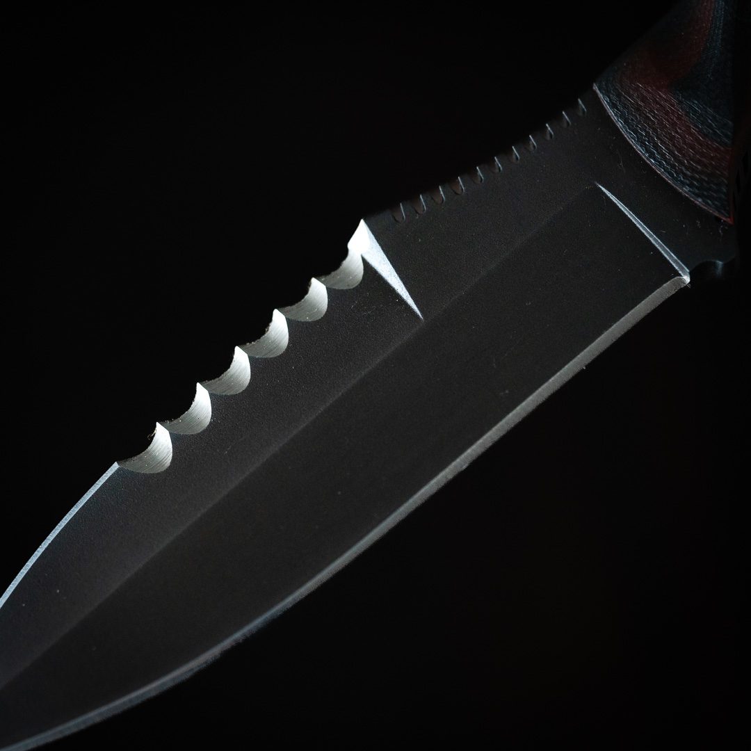 Close up of Dynamis Alliance Revere 3.75 inch double-edged blade crafted from 80CRV2 high carbon steel