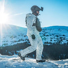Operator wearing Salomon Quest 4D Forces 2 Boots in a cold-weather mountain environment, showcasing traction and all-terrain capability.