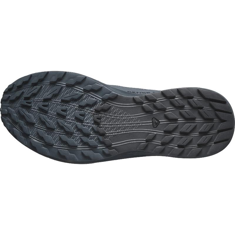 Sole view of the Salomon Trail Running Shoe in India Ink (Navy Blue) showing the aggressive traction pattern and ASTM F3445-rated slip-resistant rubber outsole. Built for tactical professionals, law enforcement, and EMS who need grip and stability on slick floors, trails, and mixed terrain. Lightweight, high-performance hybrid footwear engineered for duty, running, and training.