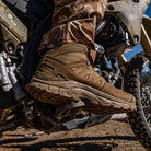 Operator wearing Salomon XA Forces Mid boots during patrol activities, showcasing comfort and mobility in demanding environments.