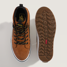 Brown sneaker with black laces and sole on a light gray background