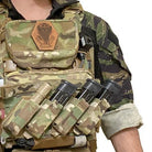 Shaw Concepts ARC Admin Pouch worn on a plate carrier by an operator, showing low profile tactical admin and EUD pouch integrated into a combat loadout for document storage, comms tools, and mission essential accessories without blocking rifle magazine access