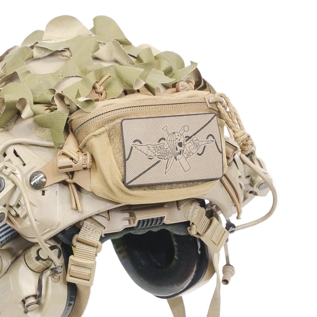 Rear angle view of Shaw Concepts BRAIN Pouch mounted on tactical helmet for NVG counterweight balance and battery storage, low profile expandable helmet pouch built for military combat gear, law enforcement duty setups, and professional night vision operations made in the USA