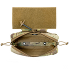 Open view of the Shaw Concepts RAID Pouch LITE showing the full loop-lined interior, elastic tourniquet sleeve, dual pen slots, and wide-opening zippered compartment.