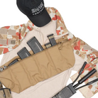 Shaw Concepts ReUp Bandolier .308 in Coyote shown in flat lay loaded with rifle magazines, modular ammo bandolier carrying .308 or 5.56 mags with side utility pockets, compact crossbody reload rig for combat gear, range training, vehicle staging kits, and law enforcement duty setups made in the USA