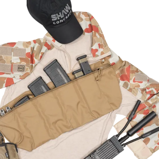 Shaw Concepts ReUp Bandolier .308 in Coyote shown in flat lay loaded with rifle magazines, modular ammo bandolier carrying .308 or 5.56 mags with side utility pockets, compact crossbody reload rig for combat gear, range training, vehicle staging kits, and law enforcement duty setups made in the USA