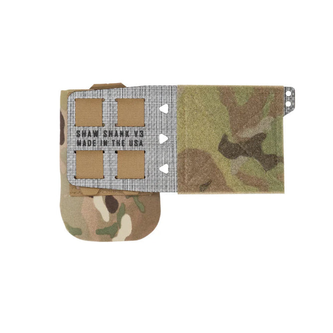 Shaw Concepts Shaw Shank V3 in Multicam shown without blade, low profile fixed blade knife pouch with Tegris mounting flap and loop lined interior designed for plate carrier side mounting, tactical kit setups, and professional combat gear configurations made in the USA