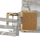 Spiritus Systems MOLLE Expander Wing in Multicam installed beneath a plate carrier cummerbund with Tubes quick-release hardware, demonstrating mounting compatibility.
