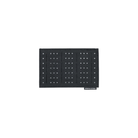 A black rectangular studded panel with a grid pattern of silver metal studs, shown against a plain white background. A small black brand tag on the bottom right reads 'SPIRITUS SYSTEMS'.
