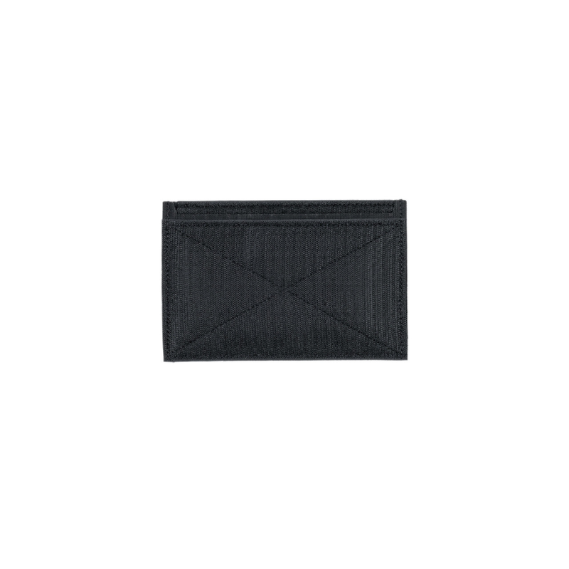Velcro backing of panel with diagonal stitched details, shown flat against a solid white background.