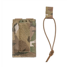 Spiritus Systems EMP Single Elastic Mag Pouch shown with the elastic bungee retention band securing a 5.56 magazine. Low-profile MultiCam pouch with MOLLE mounting, tie-down points, and loop panel for modular Spiritus Systems compatibility.