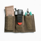 Spiritus Systems TEMP Triple Elastic Mag Pouch in Ranger Green shown in use, carrying 5.56 magazines. Elastic construction with bungee retention kit and loop panel keeps loadouts secure and modular. Compatible with Spiritus chest rigs, cummerbunds, and packs.