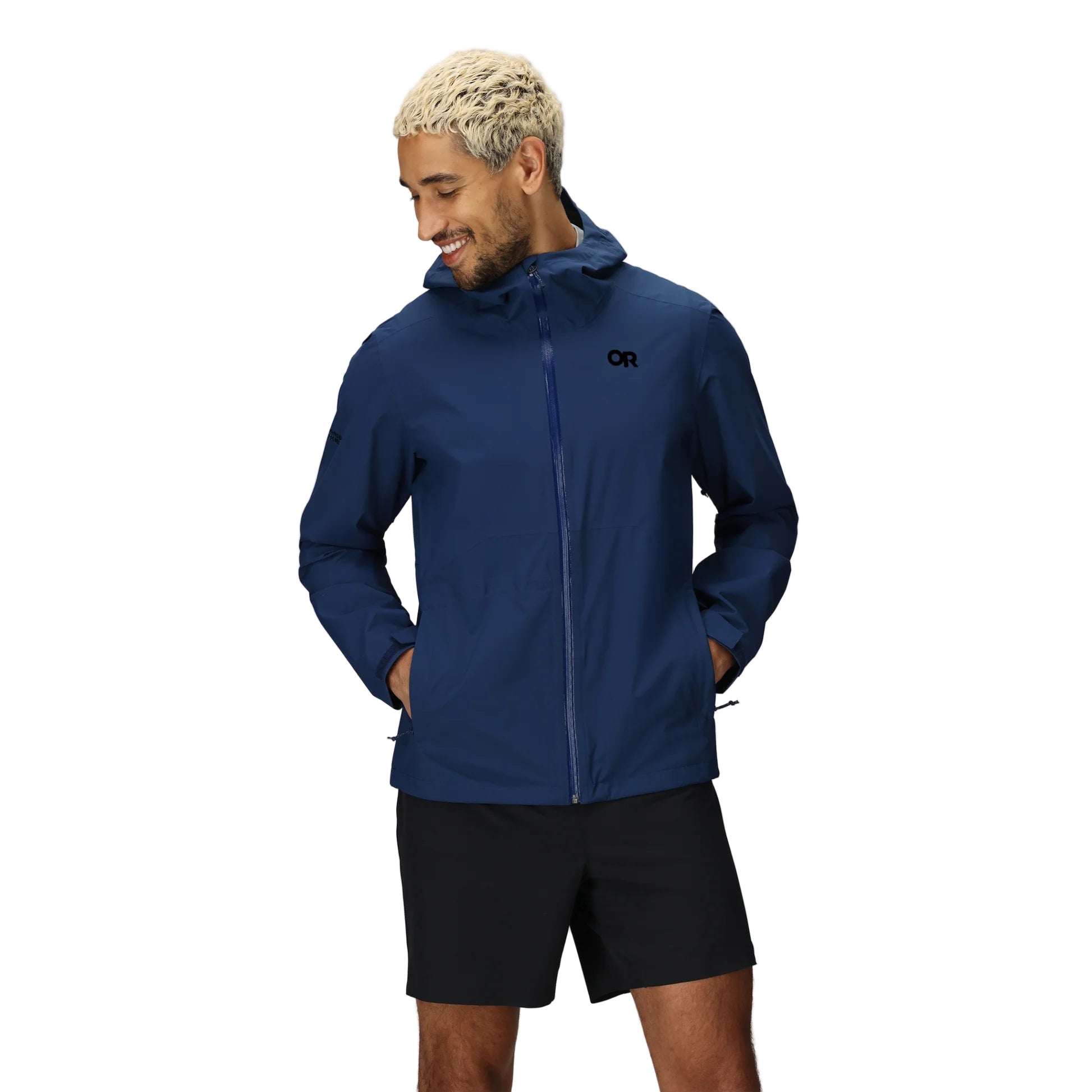 Front view of the Stratoburst Rain Jacket in bold Cenote blue, shown on-body for fit reference and field-ready design with storm coverage and range-friendly movement