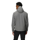Back view of the Outdoor Research Stratoburst Rain Jacket in Wolf Grey, showing adjustable hood, minimalist design, and weatherproof silhouette for tactical movement