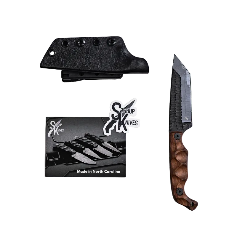 Wood handle Stroup Bravo 5 Tanto featuring Black Cerakote tanto blade positioned next to Kydex sheath with belt mount system