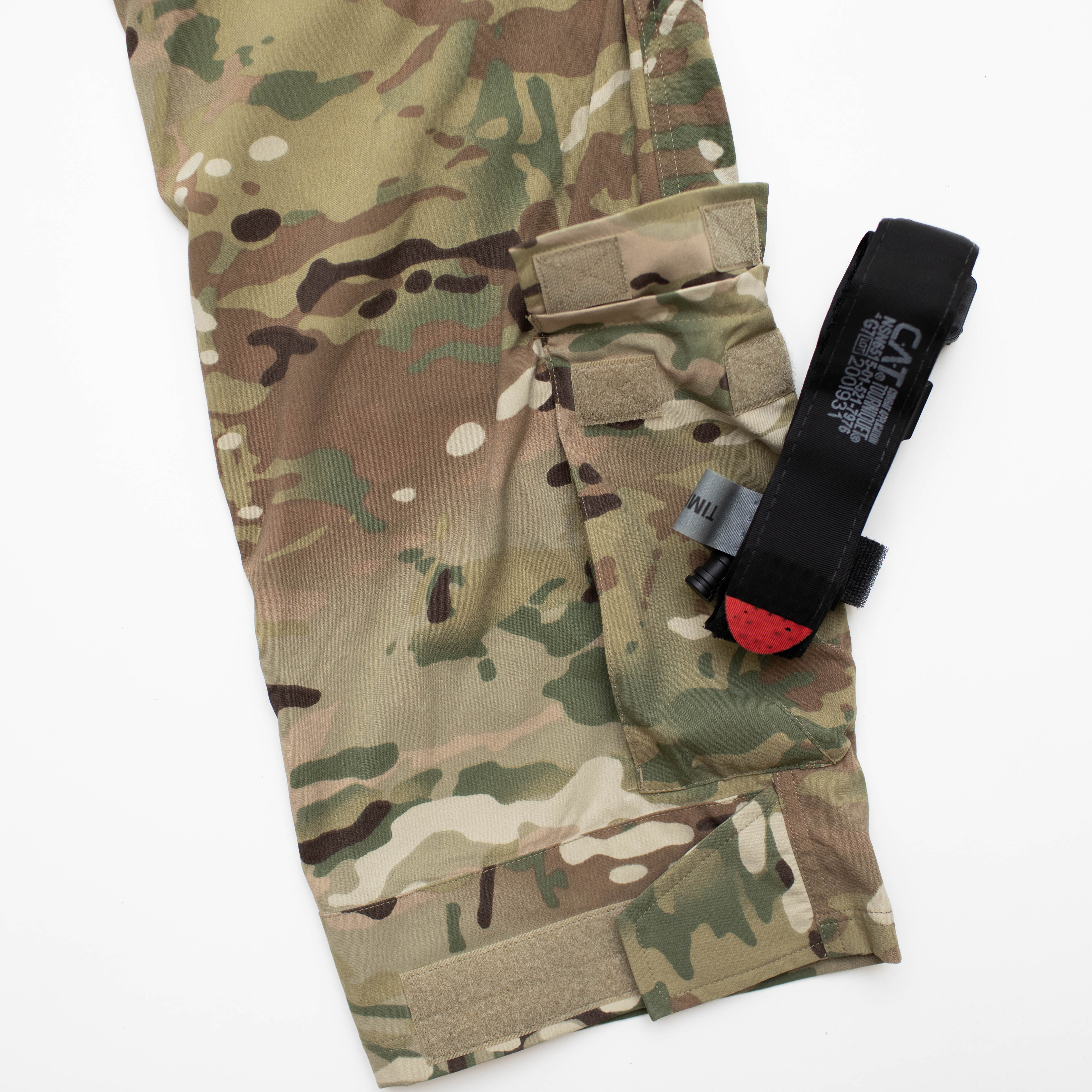 Close-up of TD Cordell Amphib Combat Pants V2 in MultiCam® Agility showing the new ankle cargo pocket, perfectly sized to hold a tourniquet or compact first aid essentials. Amphibious tactical pants designed for EDC functionality, quick-dry performance, and mission-ready versatility.