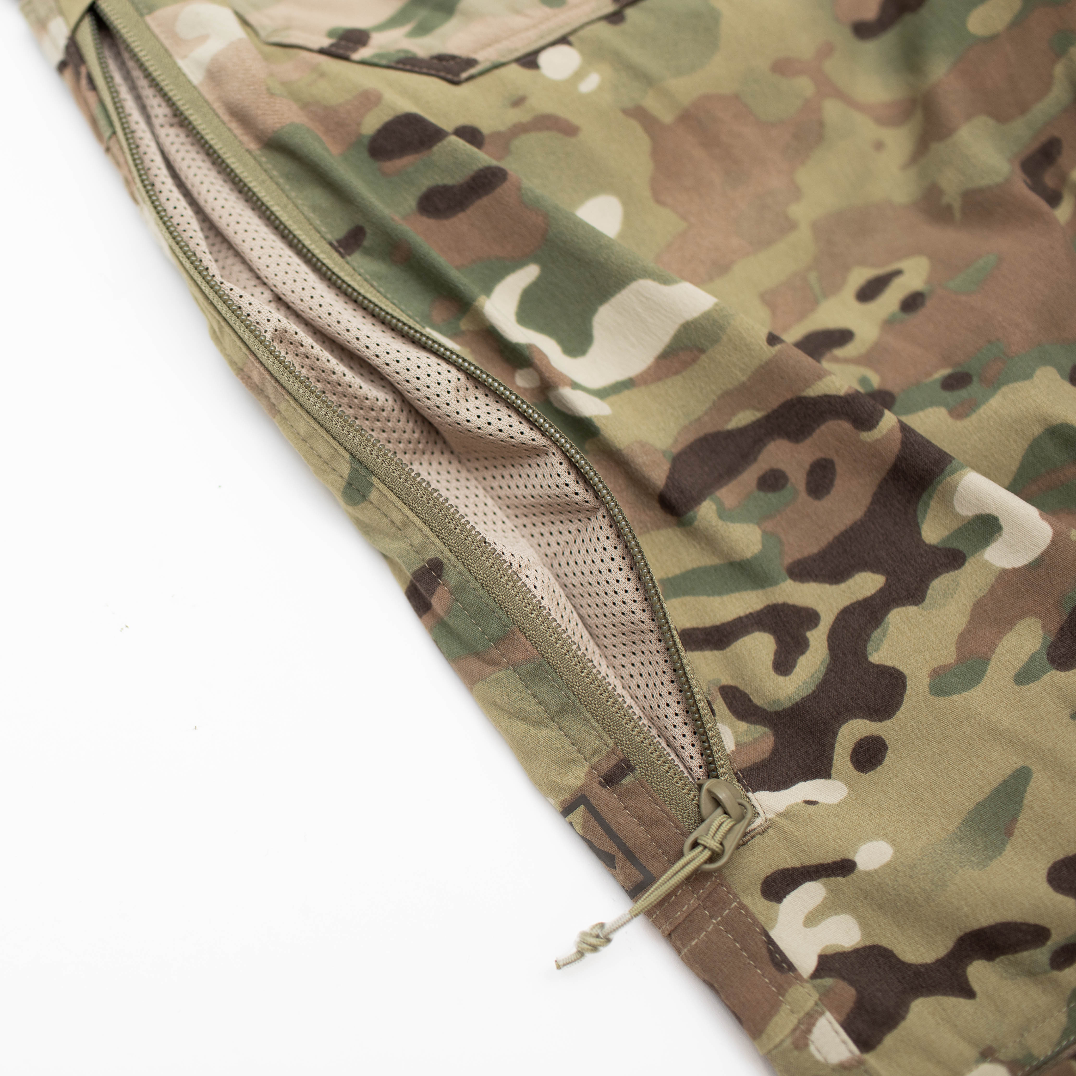 Close-up of TD Cordell Amphib Combat Pants V2 in MultiCam® Agility showing the mesh-backed side zipper vent for breathability and heat release. Amphibious tactical pants built with Brookwood quick-dry fabric, ideal for range training, EDC, and high-output field missions in hot or wet environments.