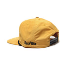 Rear view of the TD Goat Rope Cap in Biscuit highlighting the adjustable snapback closure and structured five-panel rope hat construction.