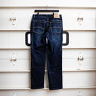 Back view of the TD McQuade Tactical Jeans in Deep Sea wash showing the reinforced rear pockets, AR mag compatible EDC pockets, concealed carry friendly waistband, and durable stretch tactical denim designed for users searching for the best tactical jeans and everyday carry pants.