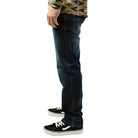 Side view of TD McQuade Tactical Jeans V2 Regular Fit, highlighting the relaxed straight leg profile, reinforced knife pocket panel, stretch denim mobility, and discreet EDC pocket placement for comfortable concealed carry and daily movement.