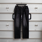 TD McQuade Tactical Jeans in the Vintage Black wash shown hanging in the regular cut, highlighting the reinforced rear pockets, AR mag compatible EDC pockets, durable stretch tactical denim, and concealed carry friendly design for users searching for the best tactical jeans and everyday carry pants.