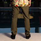 Lifestyle back view of TD Neptune Amphibious Tactical Performance Pants worn casually, showing secure zippered back pockets, articulated seat, lightweight quick-dry ripstop fabric, and amphibious tactical design perfect for everyday carry and summer adventures