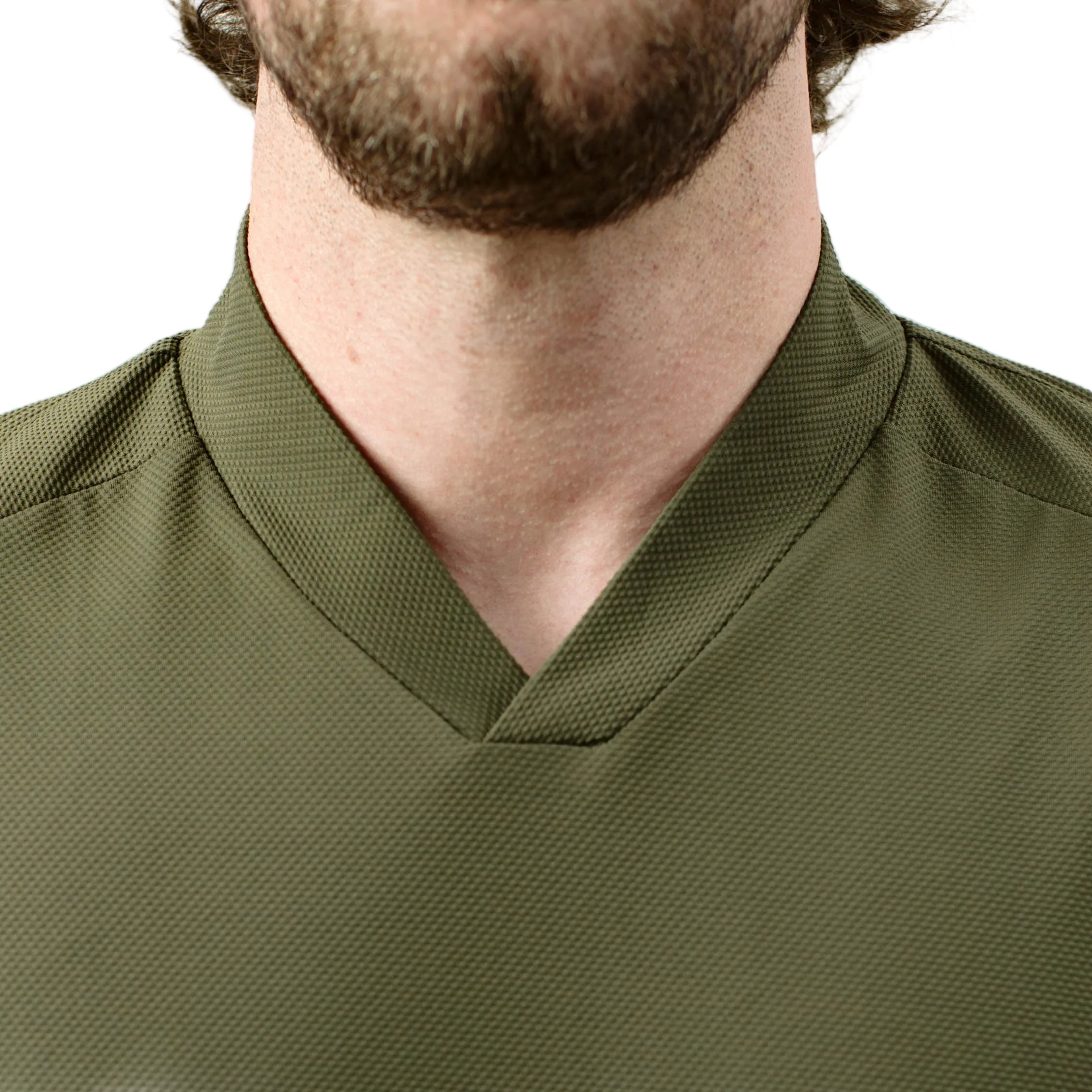 Close up of TD OSS Top in Ranger Green showing updated V neck collar engineered to reduce sling rub and protect from hot brass, lightweight tactical range shirt for operator and duty applications