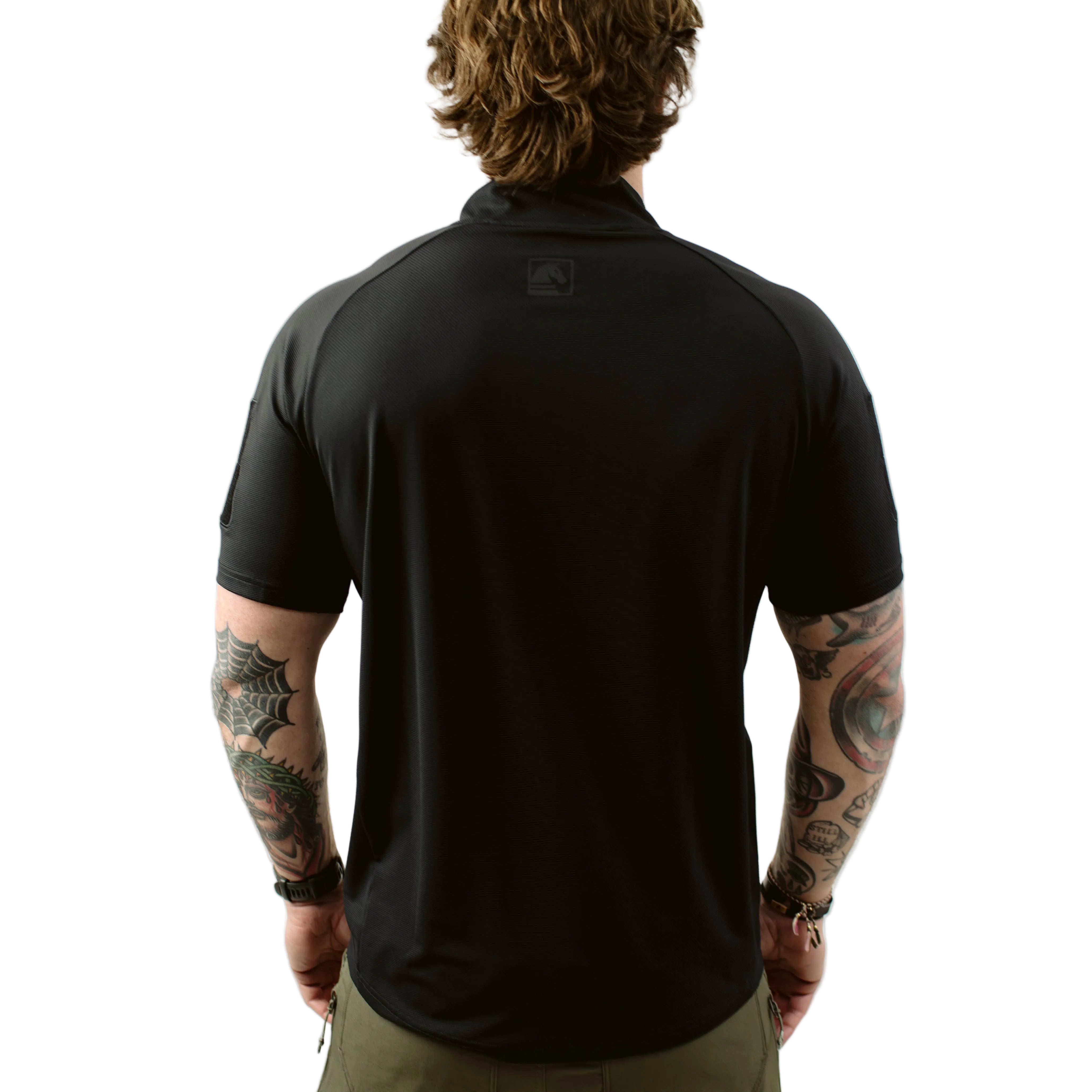 Back view of TD OSS Top Short Sleeve in Black showing athletic combat base layer fit and wrapped shoulder construction, lightweight tactical range shirt designed for hot weather training, operator use, and professional duty wear under plate carriers