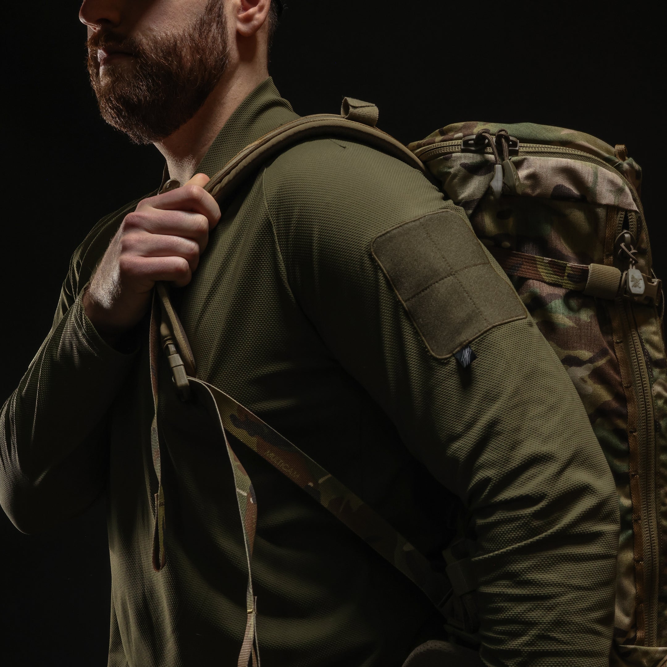 TD OSS Top V2 Long Sleeve in Ranger Green worn under pack showing anti pilling and abrasion resistance, lightweight tactical combat base layer operator shirt built for extended range training, field use, and duty wear under plate carriers and load bearing gear