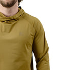 Close up of TD Outdoor Tiger Shark Sun Shirt in Arrowwood highlighting wrapped shoulder seam construction and low visibility tonal chest branding on lightweight UPF 50 tactical performance hoodie built for sun exposure and movement