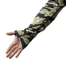 Interior arm detail of TD Outdoor Tiger Shark Sun Shirt in Golden Tiger camo showing concealed elastic thumb loop and breathable stretch fabric, tactical UPF 50 sun hoodie designed for glove integration and extended outdoor wear