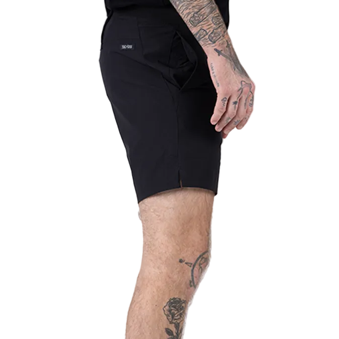 Side view of TD Workup Athletic Shorts in Black highlighting the subtle back branding detail and athletic cut. These tactical training shorts feature lightweight stretch ripstop fabric, a secure waistband, gusseted construction for freedom of movement, and EDC pocketing making them ideal for gym workouts, trail runs, and tactical fitness
