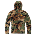 Product shot of the TD x Black Rifle Coffee Co. Reticle Half-Zip Fleece showing woodland camo design and co-branded detailing. Built from ultra-soft, high-pile Sherpa fleece with breathable birdseye mesh trim for balanced warmth and mobility. Tactical pullover made for cold-weather comfort, range days, and off-duty wear. Perfect blend of performance, attitude, and caffeine-fueled style.
