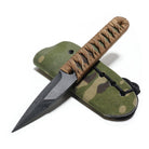 A tactical fixed-blade G10 tool with a textured black blade, brown paracord wrapped handle, and a MultiCam Tropic camouflage sheath, shown on a plain white background.