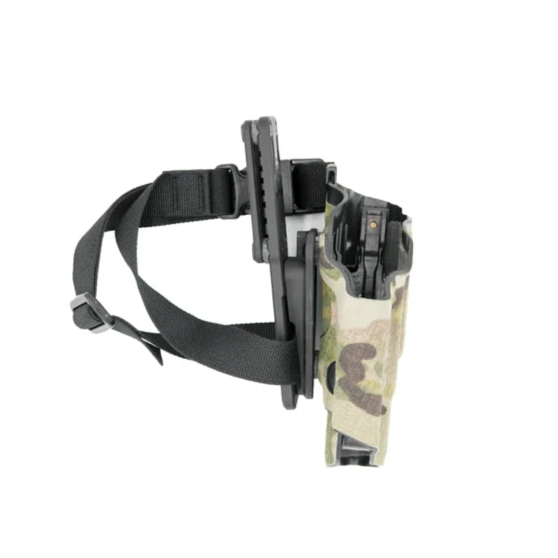 Multicam holster with a black leg strap on a white background