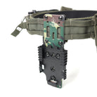 True North Concepts Modular Holster Adaptor in the TD Exclusive Woodland finish with a mounted holster, showcasing the Mid Ride configuration and stable belt attachment.