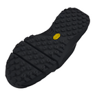 Close up of the Vibram XS Trek outsole on the Under Armour UA Charged Valsetz Mid Tactical Boots in Black, showing the multidirectional tread pattern engineered for wet grip, rugged terrain traction, and flexible movement. Highlights slip resistance, fast-rope compatible arch design, and field-ready tactical boot durability for high performance environments.